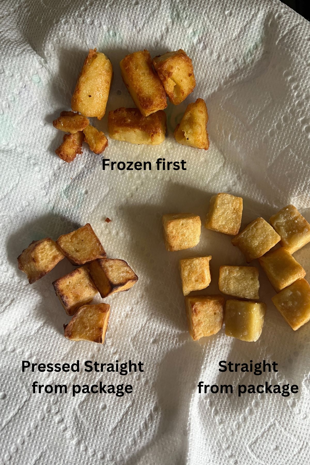 three sets of cooked chickpea tofu cooked differently on a paper towel.