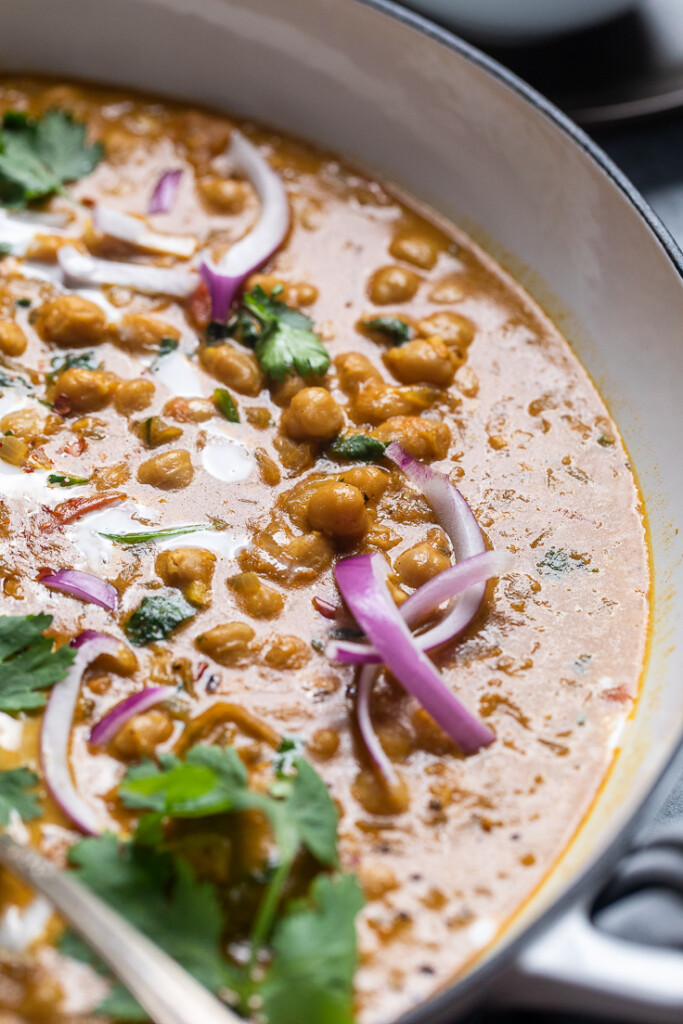 A close up of a bowl of vegan chickpea curry.