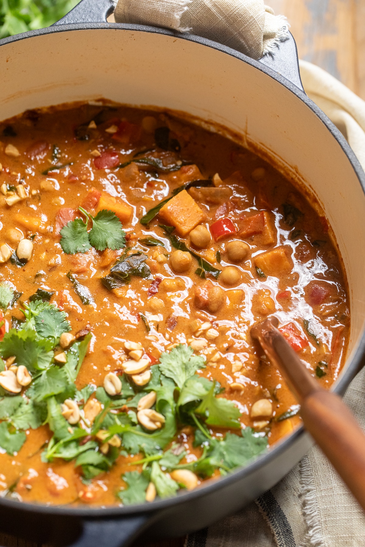 close up of vegan west african peanut stew in a large pot.